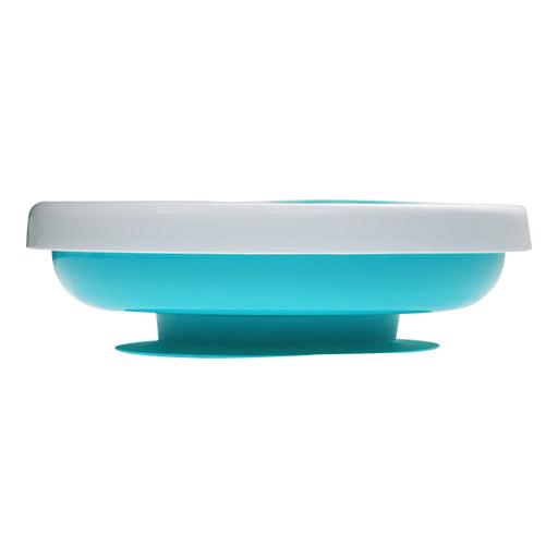 Turquoise and white plate on a white background