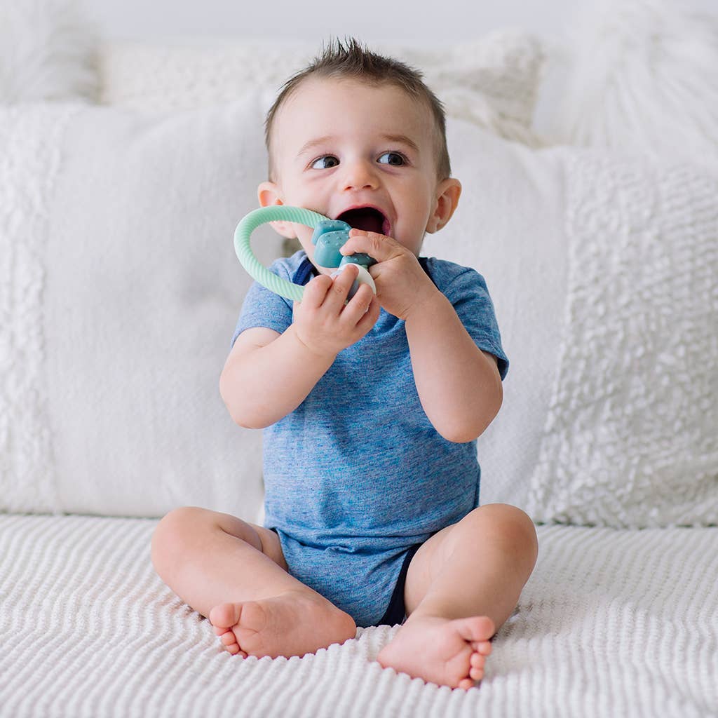 Itzy Ritzy -  Ritzy Rattle™ Silicone Teether Rattles: Highland Cow